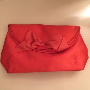Yves Saint Laurent shiny pink clutch